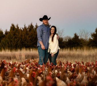 Shawn and Emily with their pasture raised hens